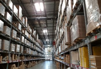 Spacious interior of a large warehouse.